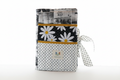 Handmade black and white floral quilted book sleeve, artisan book protector for hardcovers with monochrome botanical print.