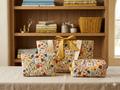 The Gold Blossom Quilted Bundle featured in IMG_20260510_205956.png showcasing the large quilted tote bag with a golden bow, the rectangular makeup bag, and the flat zipper wallet pouch together on a linen table.