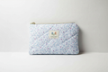 The Lavender Ditsy Floral Quilted Pouch & Small Wallet featuring a delicate purple floral top print, a lavender and white gingham check quilted base, a gold-tone top zipper with a matching fabric pull-tab, and a centered white KIALIYAH label.
