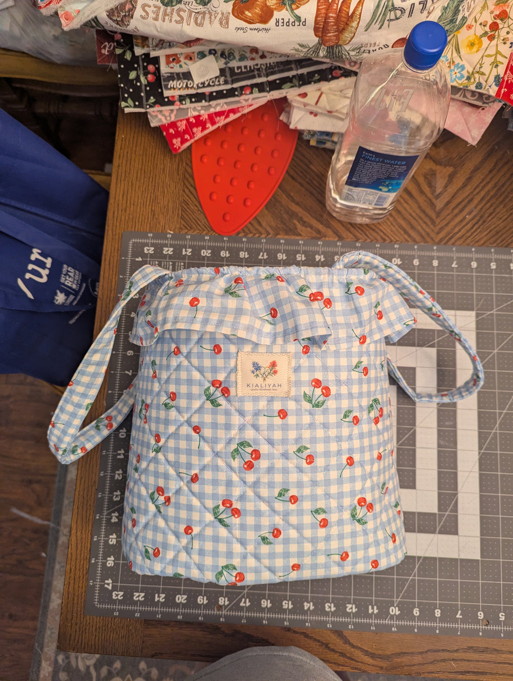 The Handmade Cherry Gingham Quilted Stroller Bag